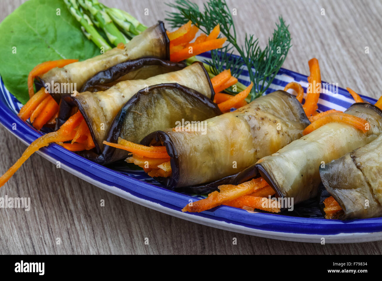 Fresh Eggplant rolls with carrot served dill Stock Photo Alamy