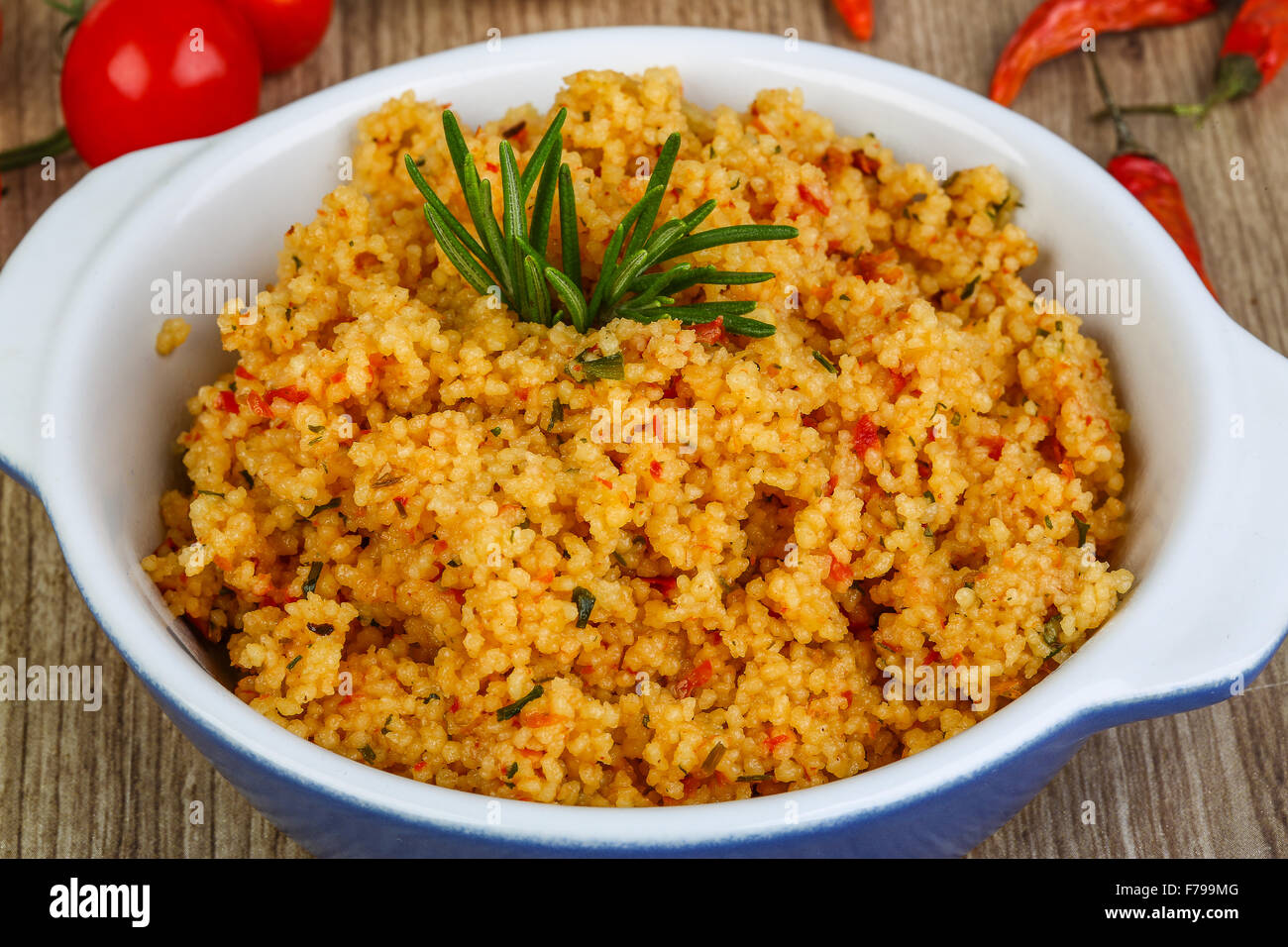 Arabic traditional cuisine Couscous with tomato and green onion Stock
