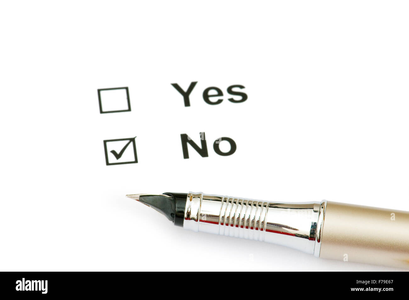 Pen and tick boxes - focus on the pen Stock Photo - Alamy