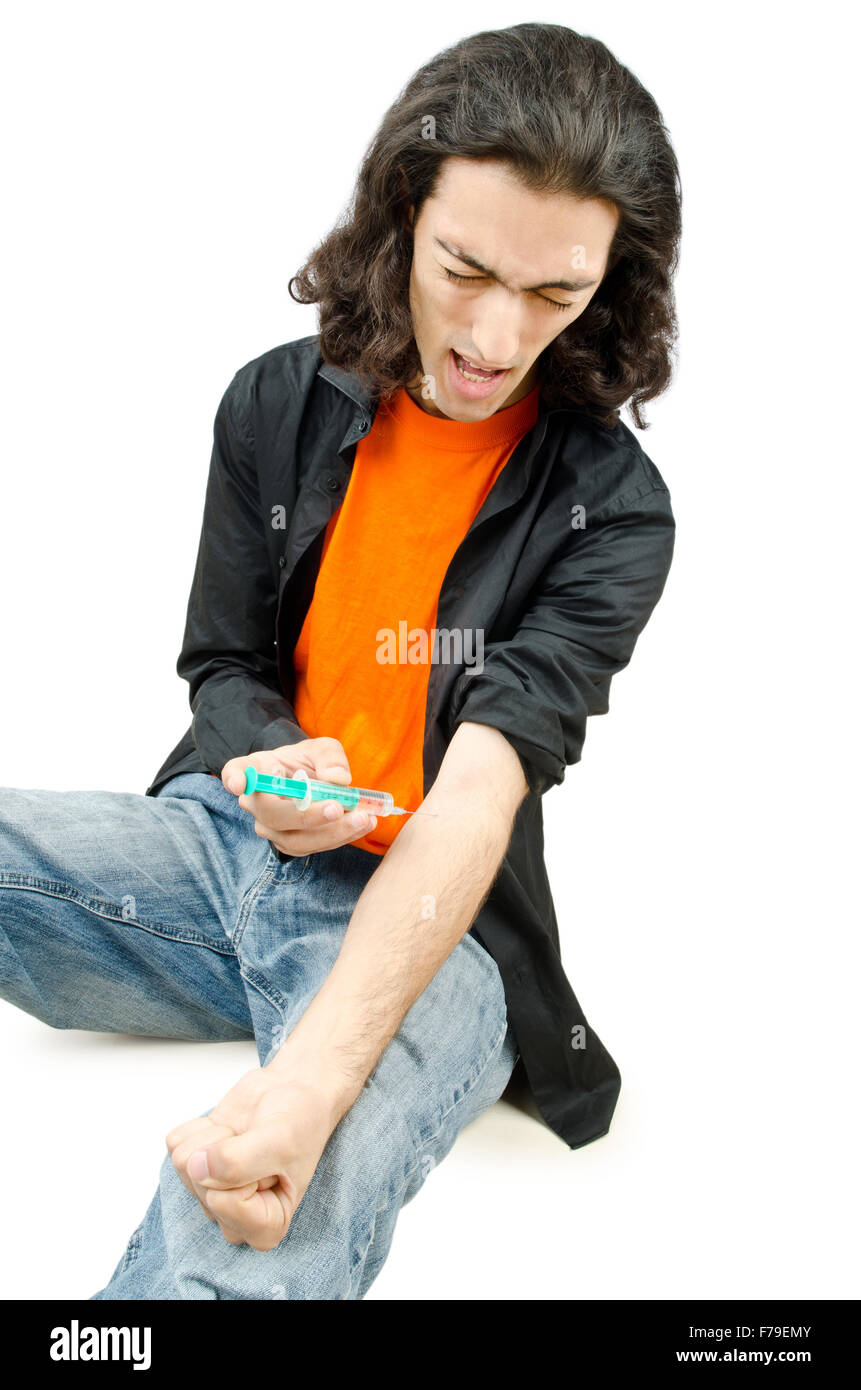 Drug addict during injection Stock Photo