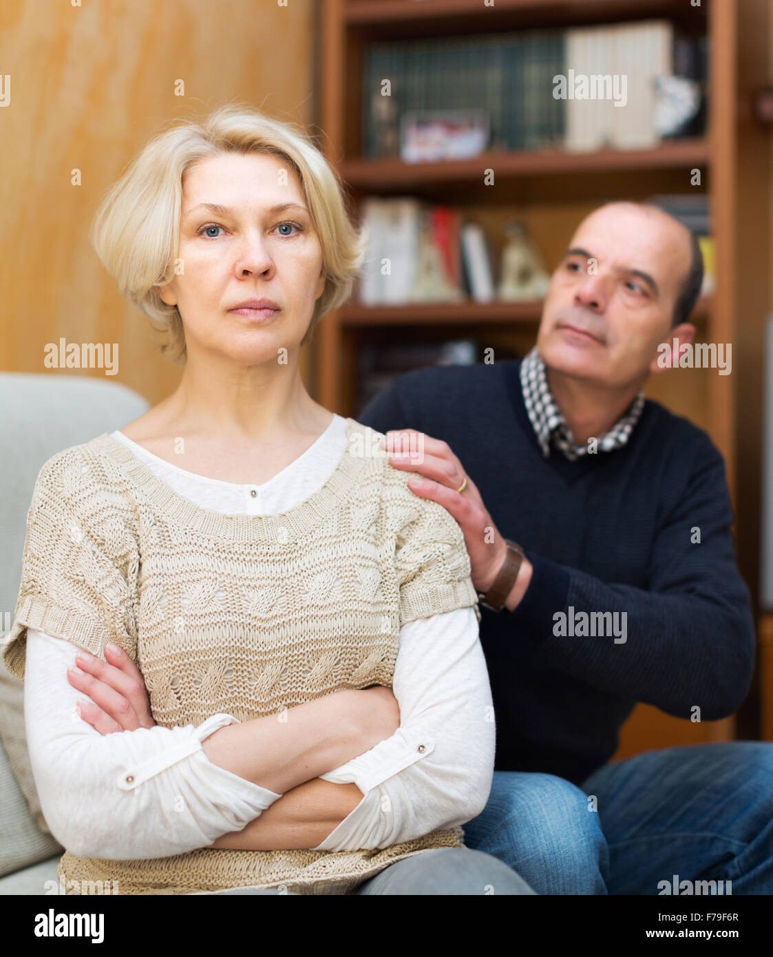Guilty mature wife asking husband hi-res stock photography and images -  Alamy