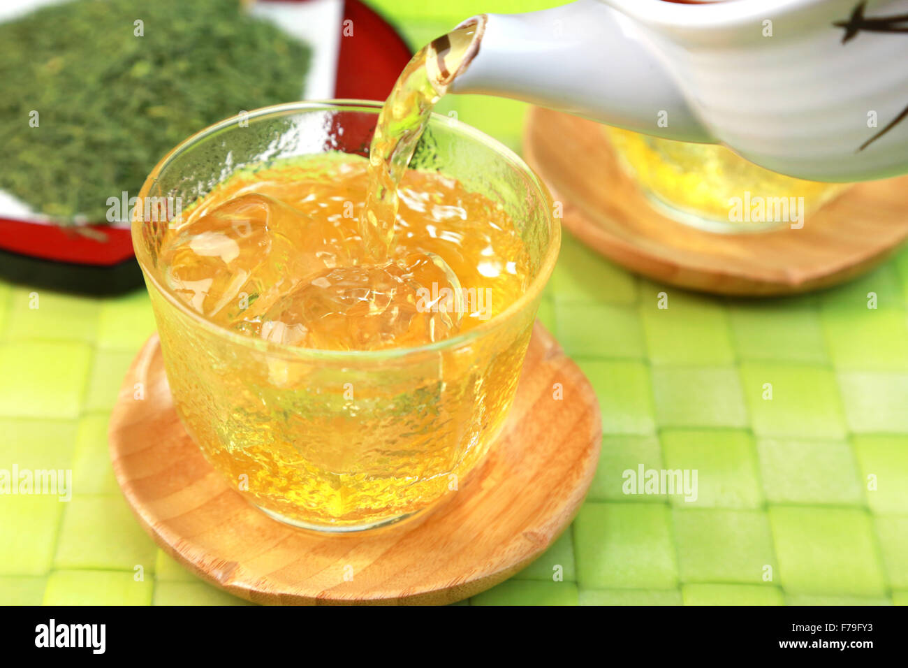 Japanese iced tea being poured into a cup Stock Photo Alamy