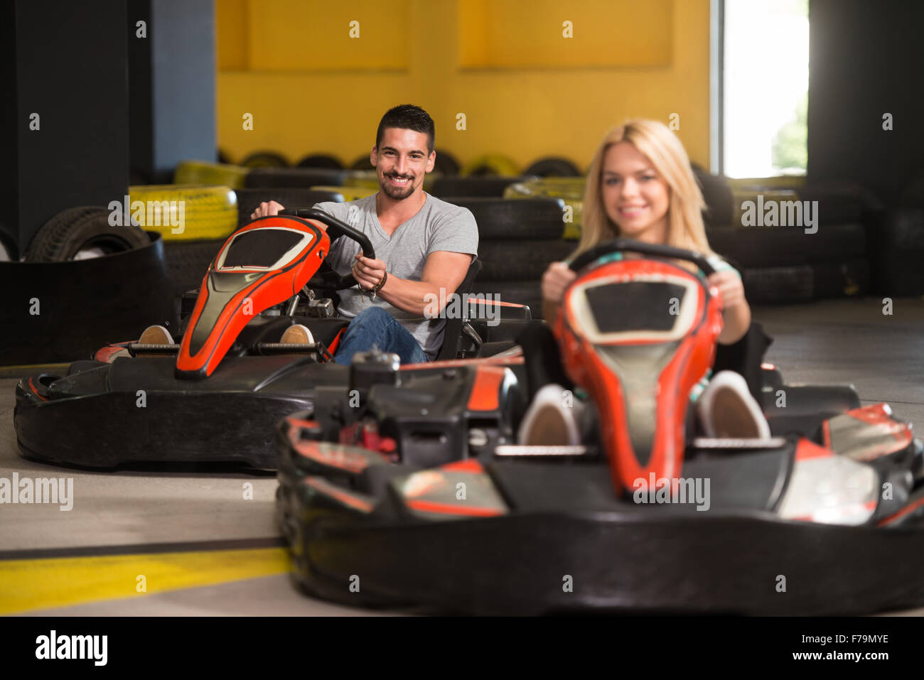 Group Of People Is Driving Go-Kart Car With Speed In A Playground ...