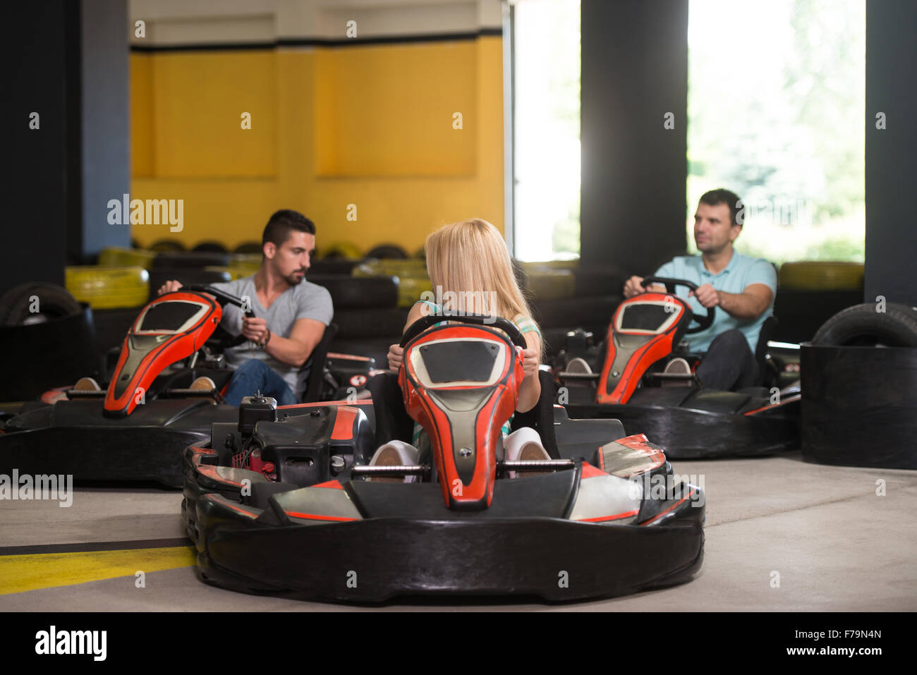 Group Of People Is Driving Go-Kart Car With Speed In A Playground ...