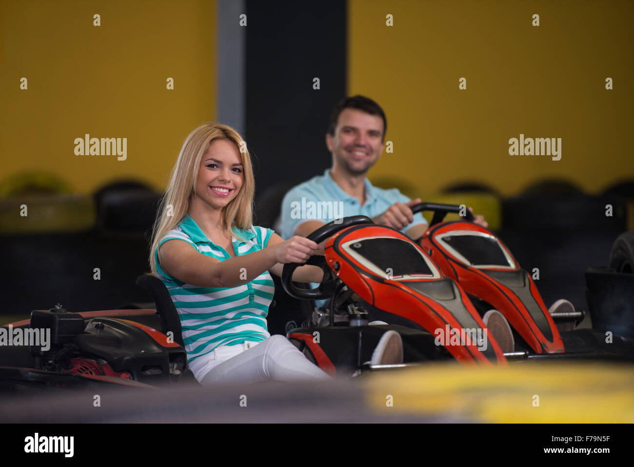 Group Of People Is Driving Go-Kart Car With Speed In A Playground ...