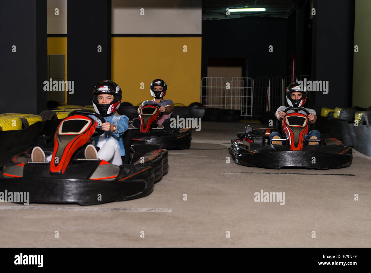 Group Of People Is Driving GoKart Car With Speed In A Playground