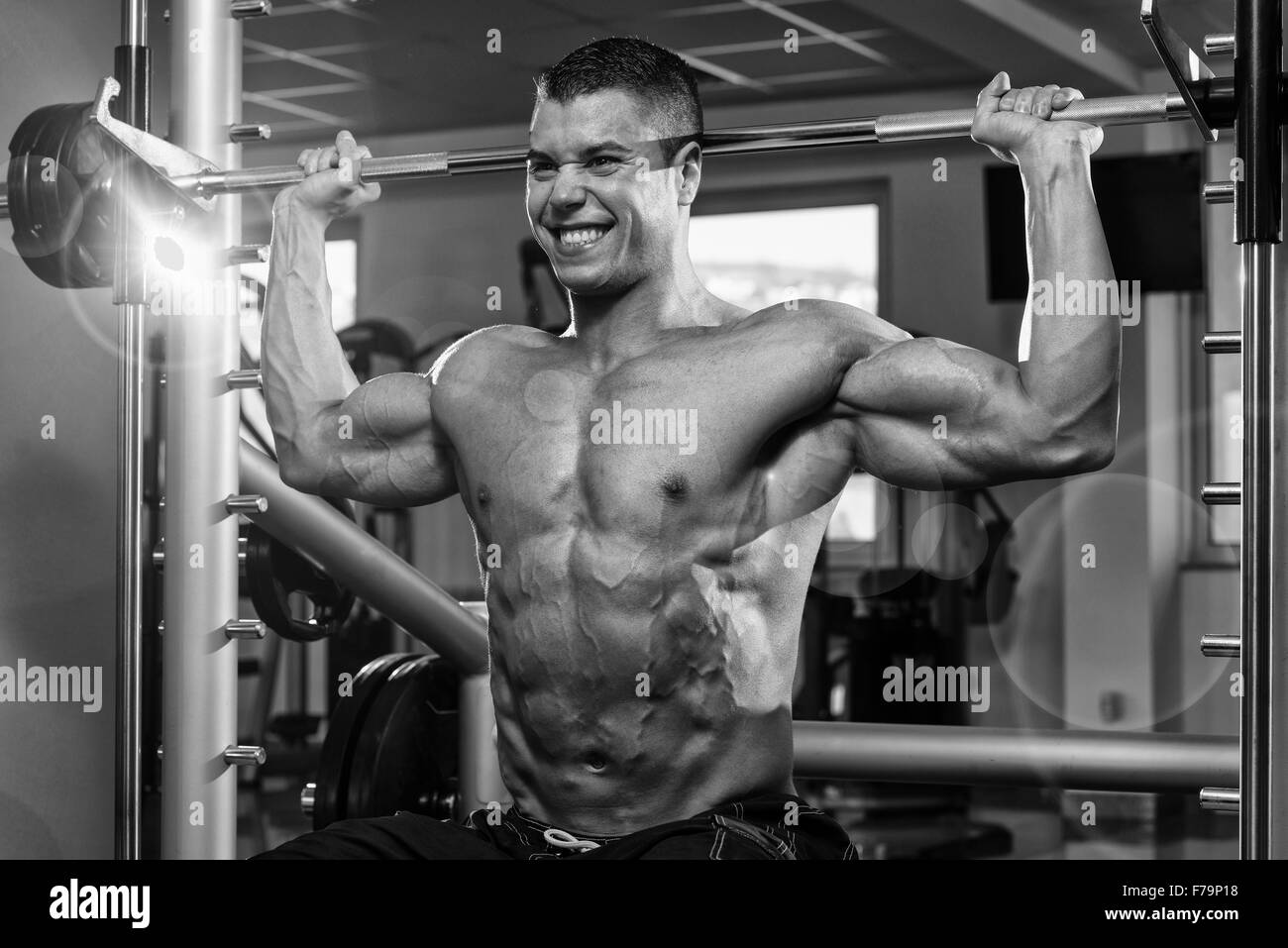 Shoulder muscles exercise Black and White Stock Photos & Images - Alamy