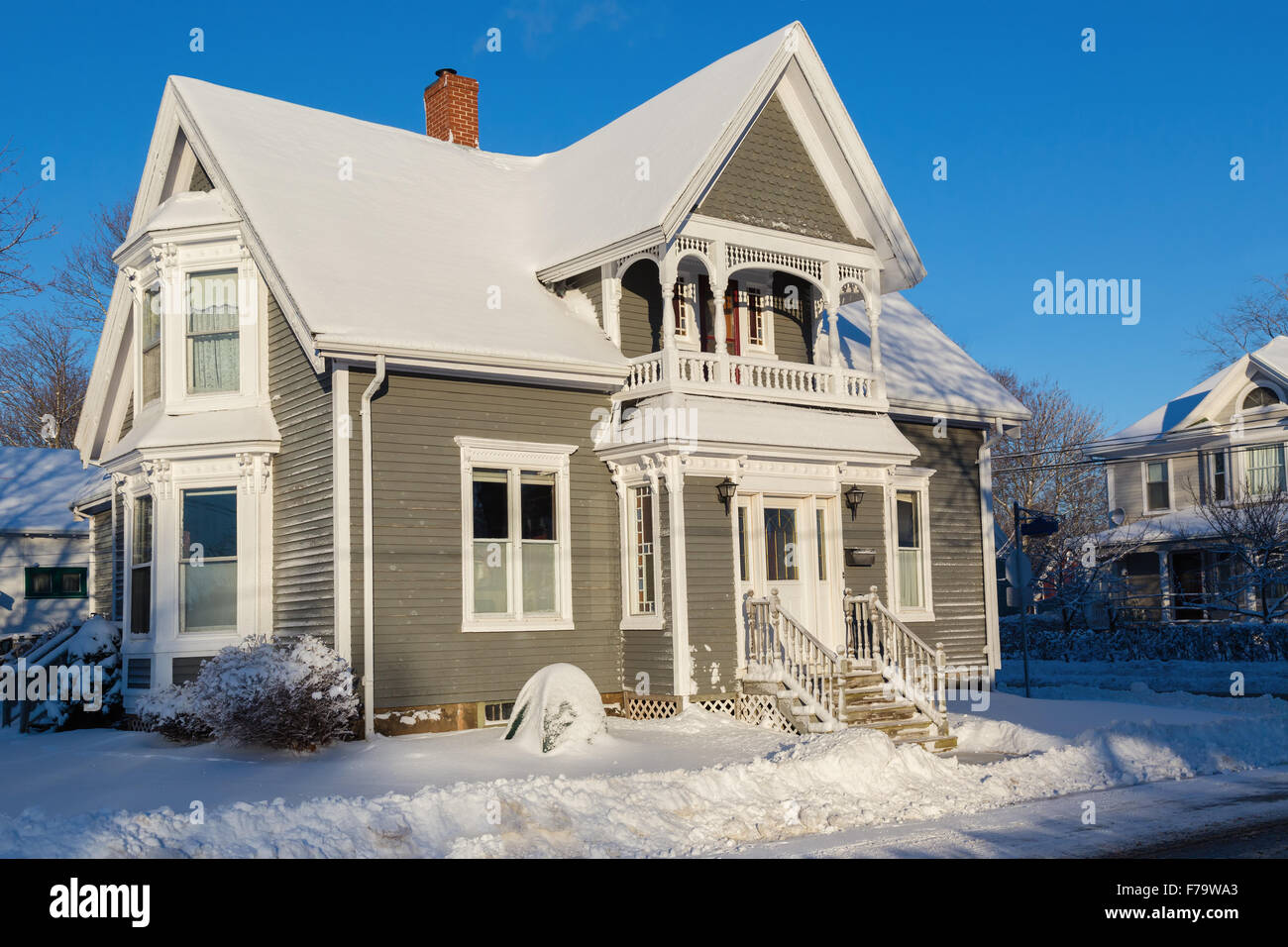 An older style North American home after a snowfall. Stock Photo