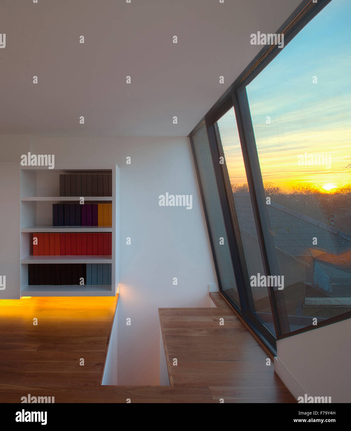 View from home office into sunset in modern family home 2012, design by Found Associates Stock Photo