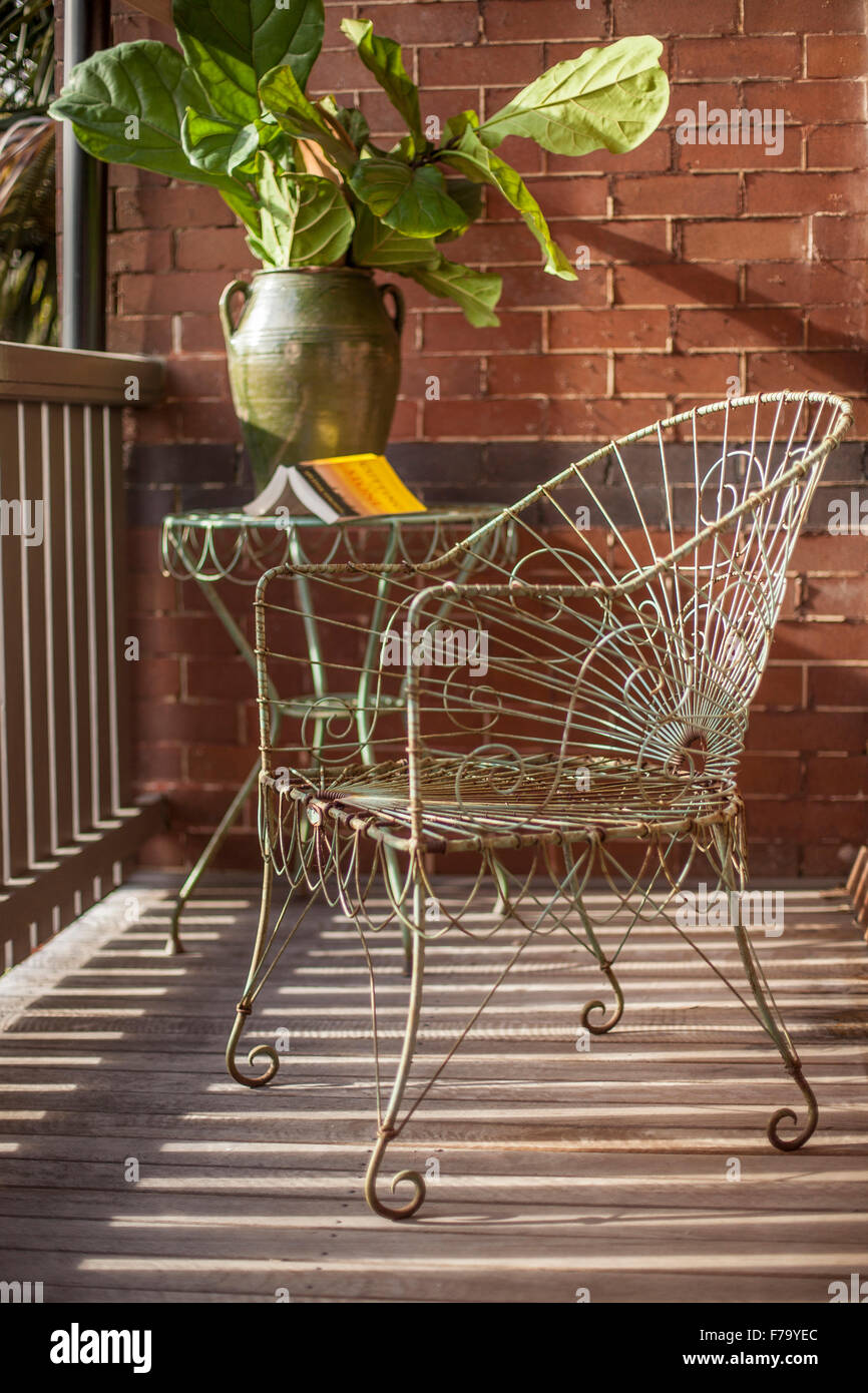 Vintage metal chair on balcony veranda of Sydney home of designer and