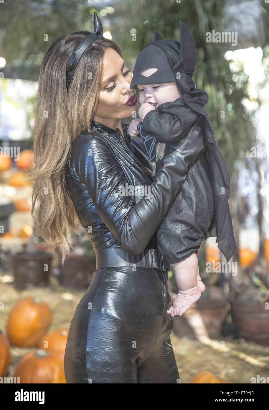 Sarah Stage poses during a Halloween themed photoshoot with her baby boy,  James, at the Toluca Lake Pumpkin Festival & Petting Zoo. The lingerie  model and her son were dressed as Catwoman