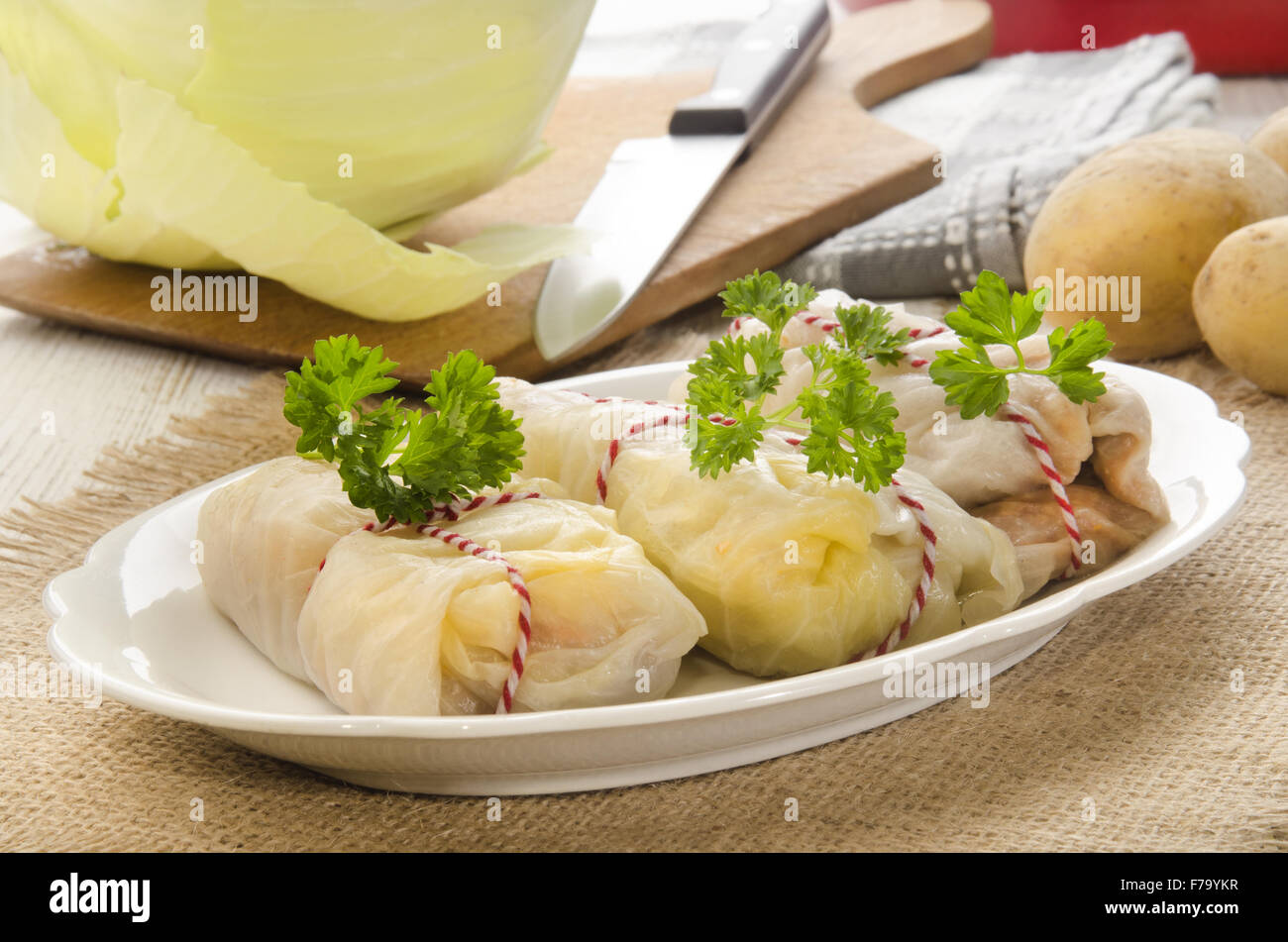 cabbage rolls filled with minced meat and rice on plate, traditional dish of many countries Stock Photo