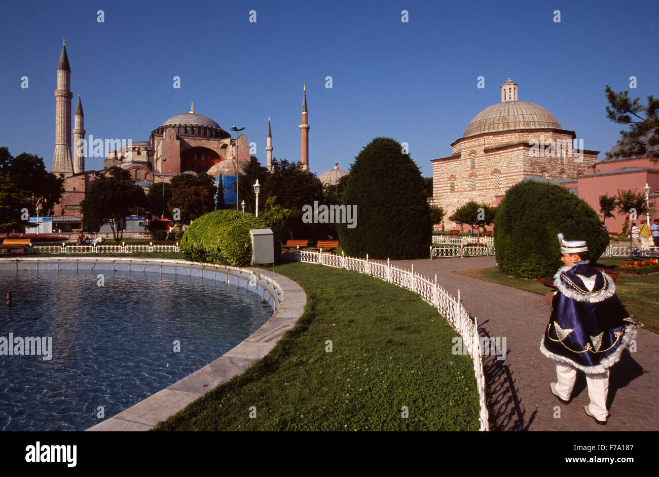 A boy who will soon be circumcised walks towards the famous Hagia Sofia in Istanbul, Turkey. Stock Photo