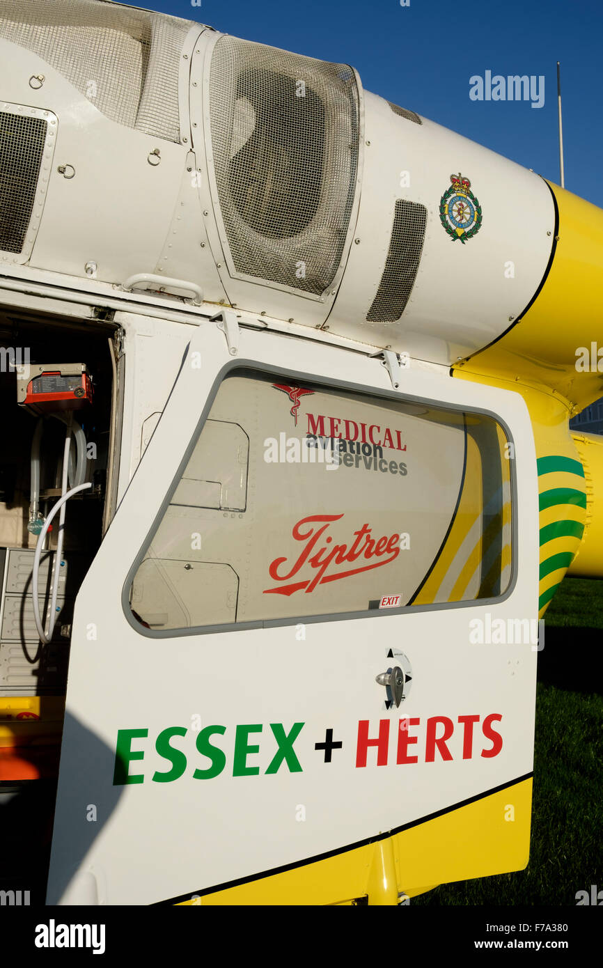 Essex and Herts air ambulance trust helicopter at bathhouse meadow Walton on the Naze Stock Photo