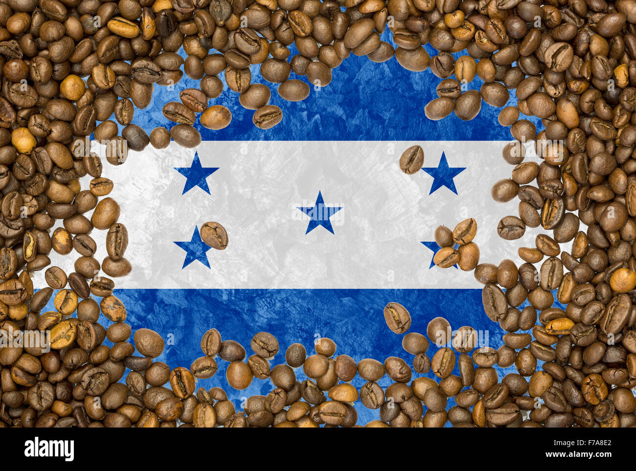 National country flag of Honduras under a background of roasted brown coffee beans Stock Photo