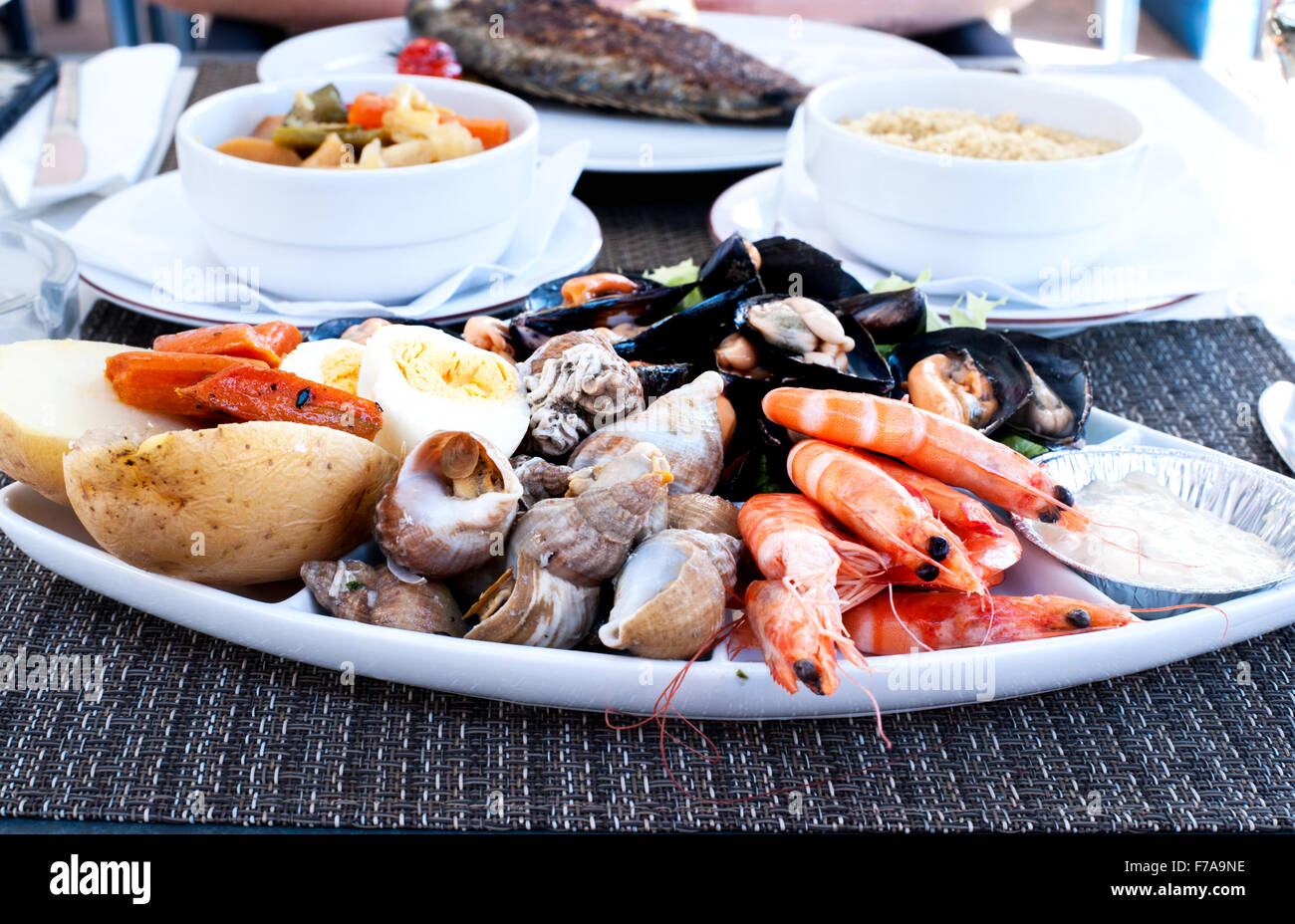 Beautiful and tasty seafood dinner on the table Stock Photo - Alamy