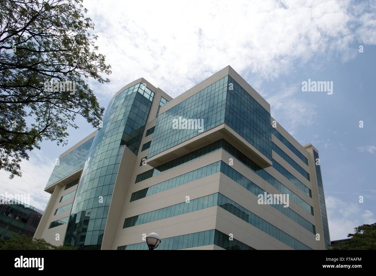 Modern building with blue sky background in singapore Stock Photo - Alamy