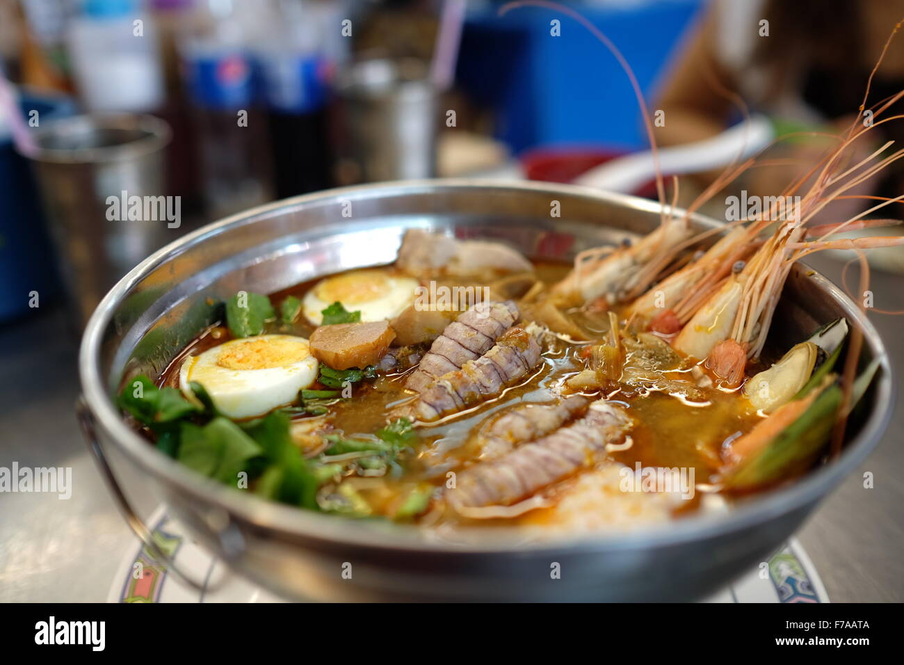 Tom yum goong (seafood hot pot) – a Thai famous menu, with a mix of mantis shrimp and other seafoods Stock Photo