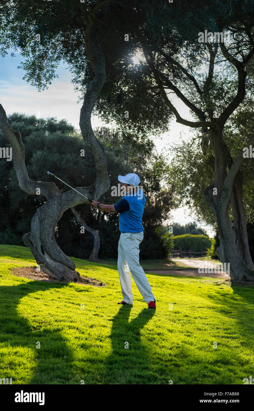 Man playing golf. Montenmedio golf course. Cadiz, Andalusia, Southern Spain. Stock Photo
