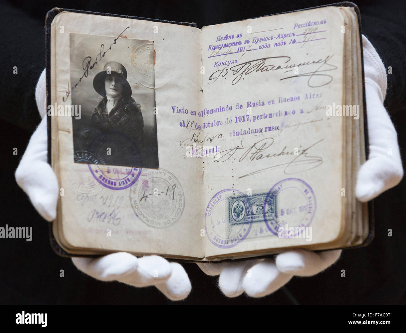 London, UK. 27 November 2015. A Christie's employee presents Anna Pavlova's passport, estimate GBP 8,000-12,000. Christie's London announce a series of sales devoted to Russian culture and art. The Russian Art sale takes place on 30 November and the Valuable Book and Manuscript sale on 1 December. Stock Photo