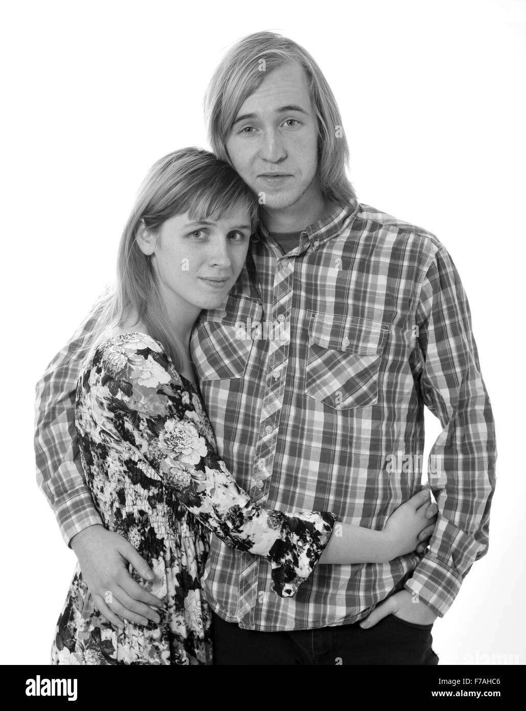 Young loving couple isolated on white background Stock Photo - Alamy
