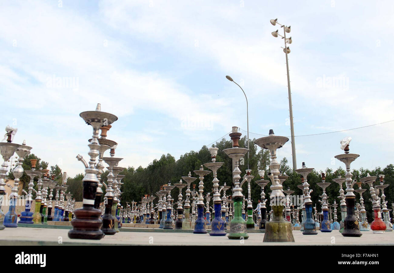 Defence Housing Authority's staffs arranging seized Sheesha (Hookah) at