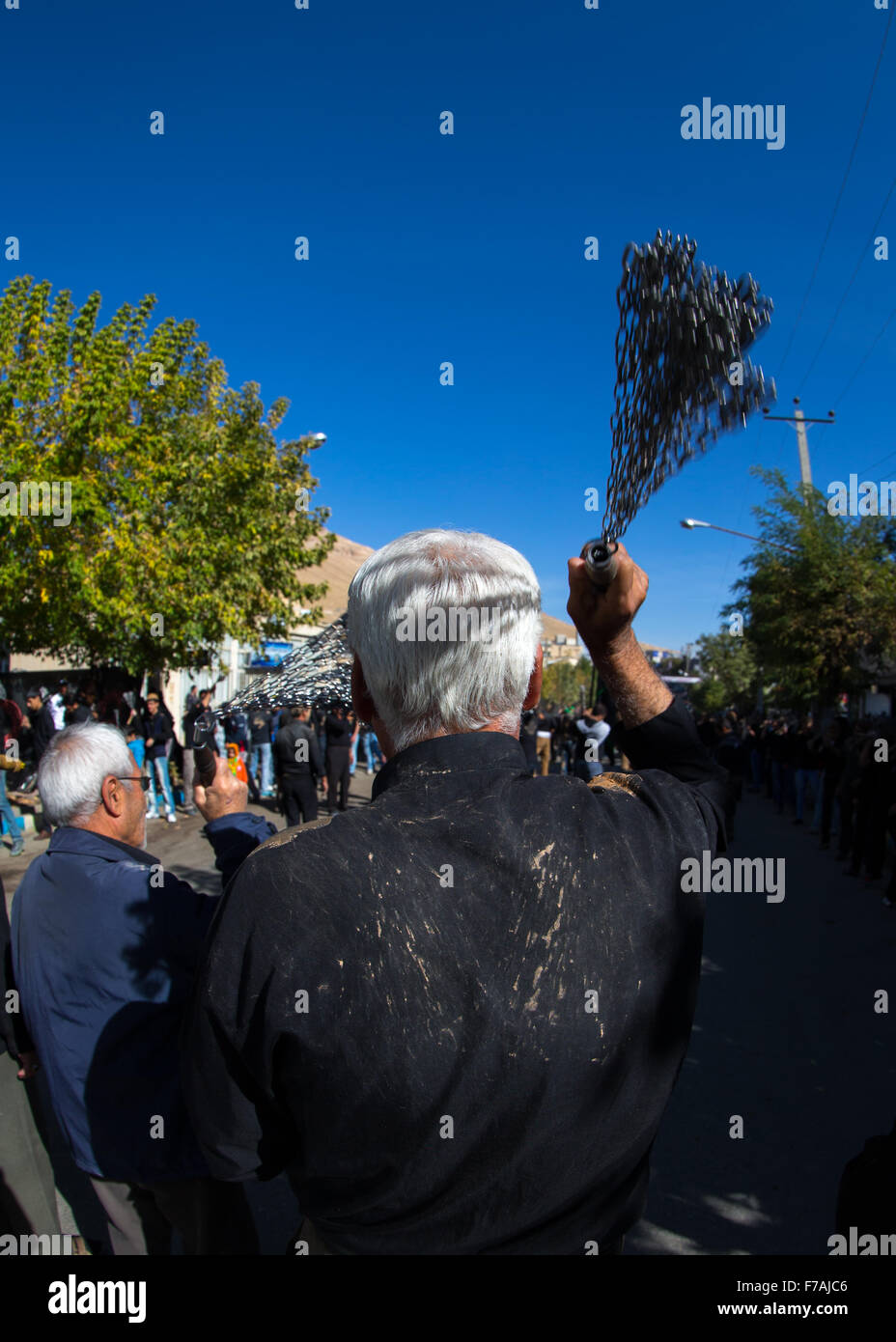 Iranian Shiite Men Are Beating Themselves With Iron Chains To Commemorate Ashura, The Day Of The Death Of Imam Hussein, Kurdistan Province, Bijar, Iran Stock Photo