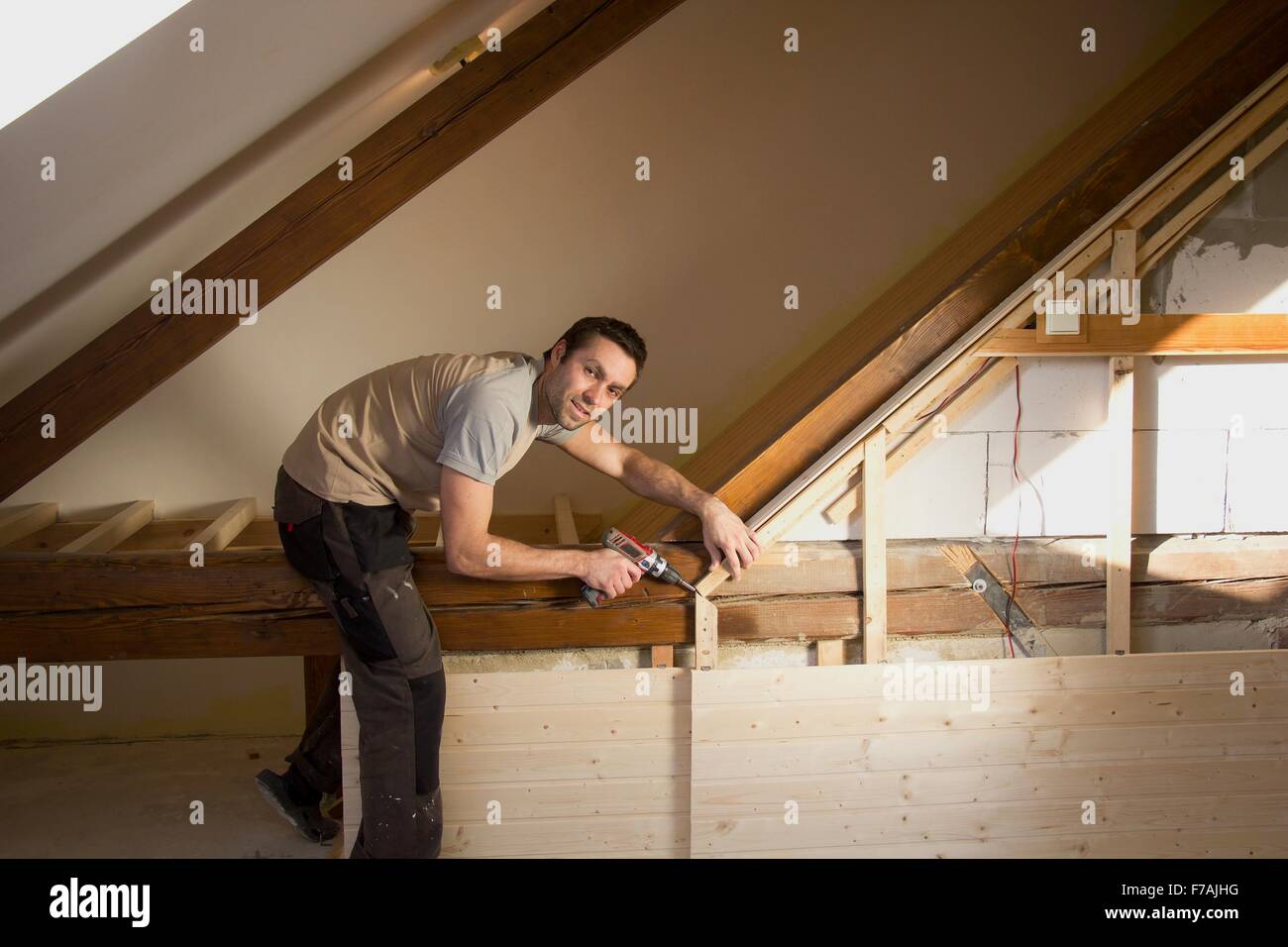 Reconstruction of the attic (building a child's room) Stock Photo