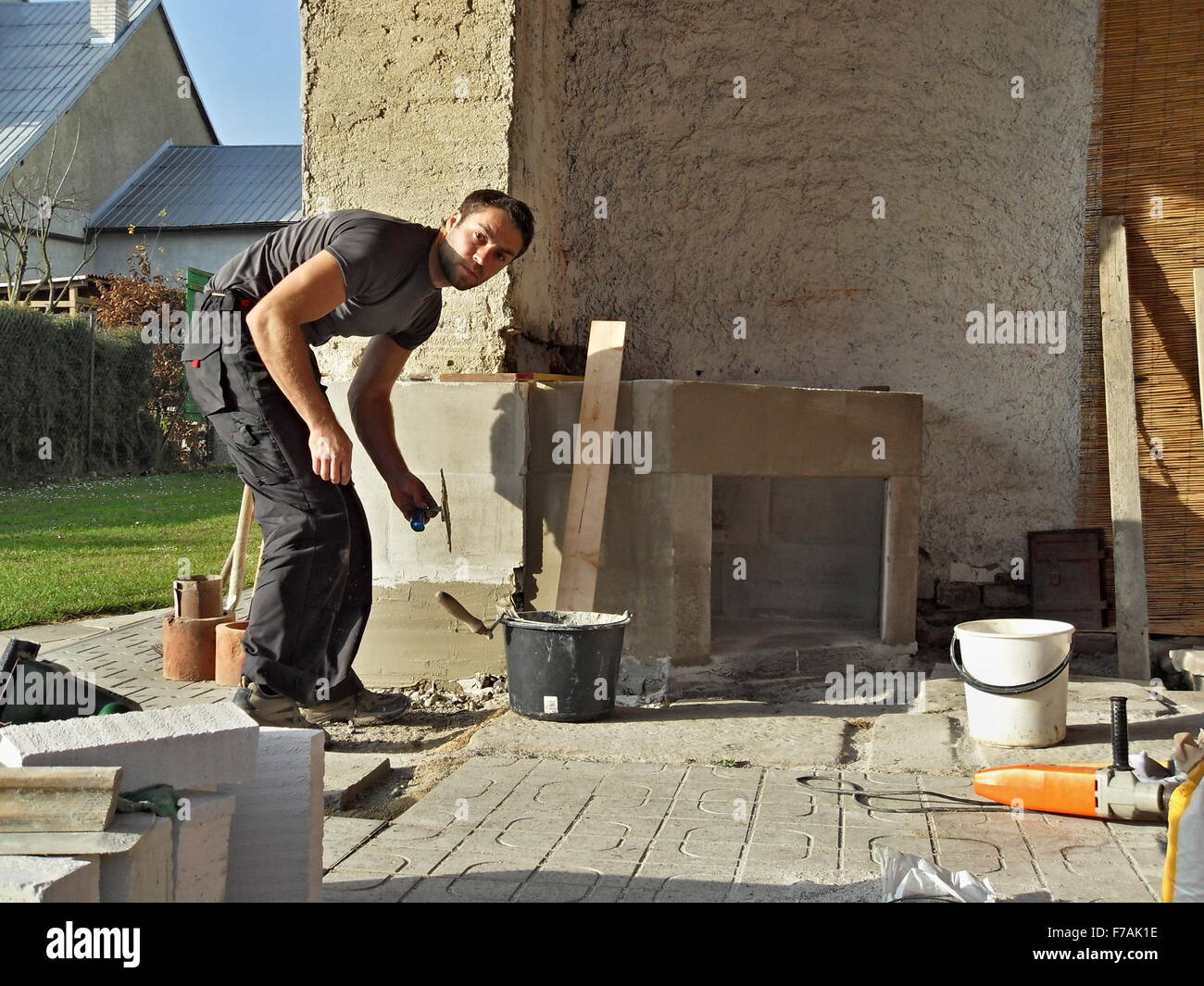 building an outdoor fireplace with smoke Stock Photo Alamy