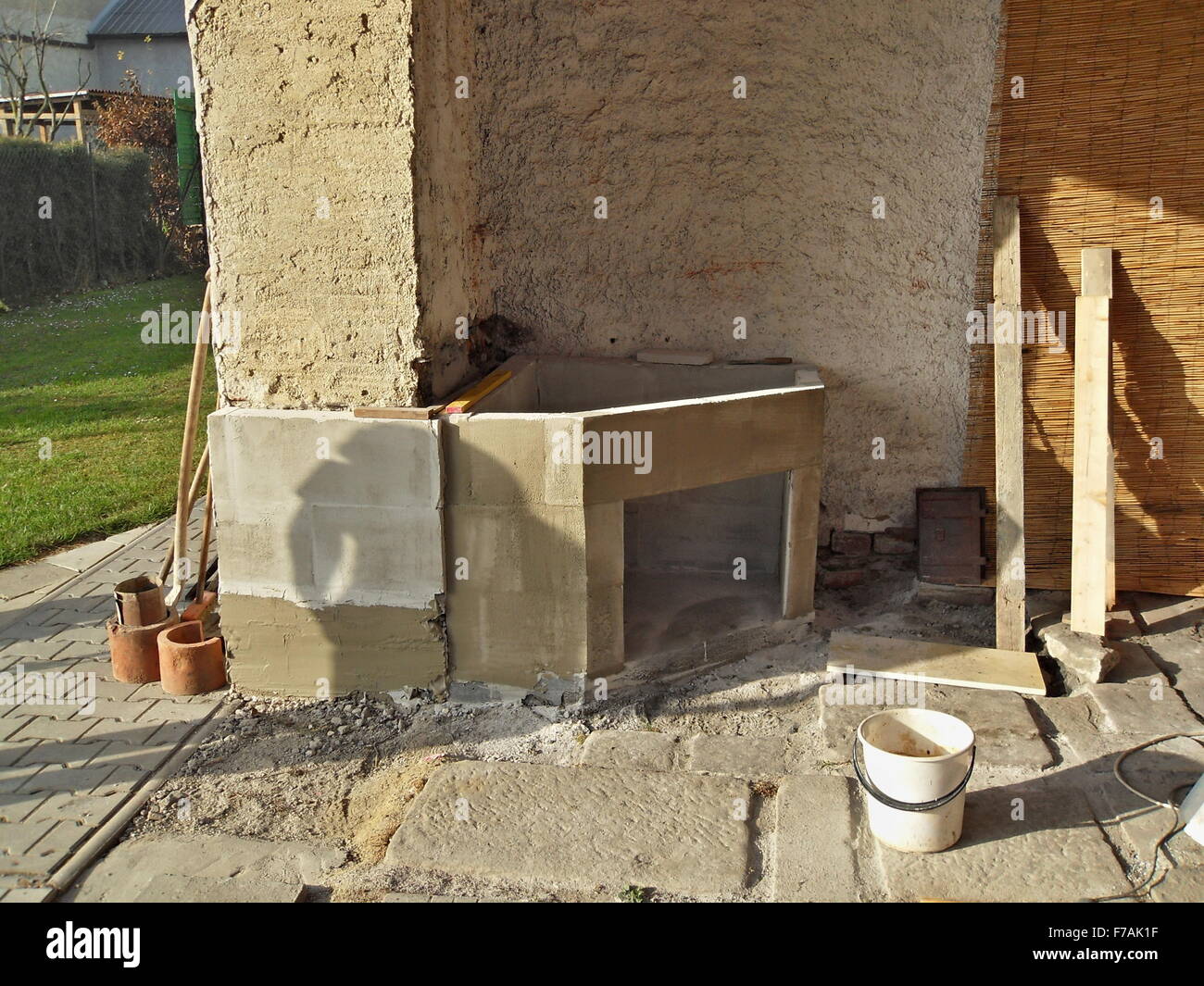 building an outdoor fireplace with smoke Stock Photo Alamy