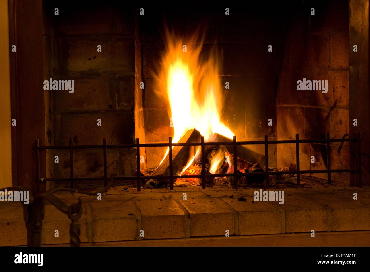 burning fire in home fireplace Stock Photo - Alamy