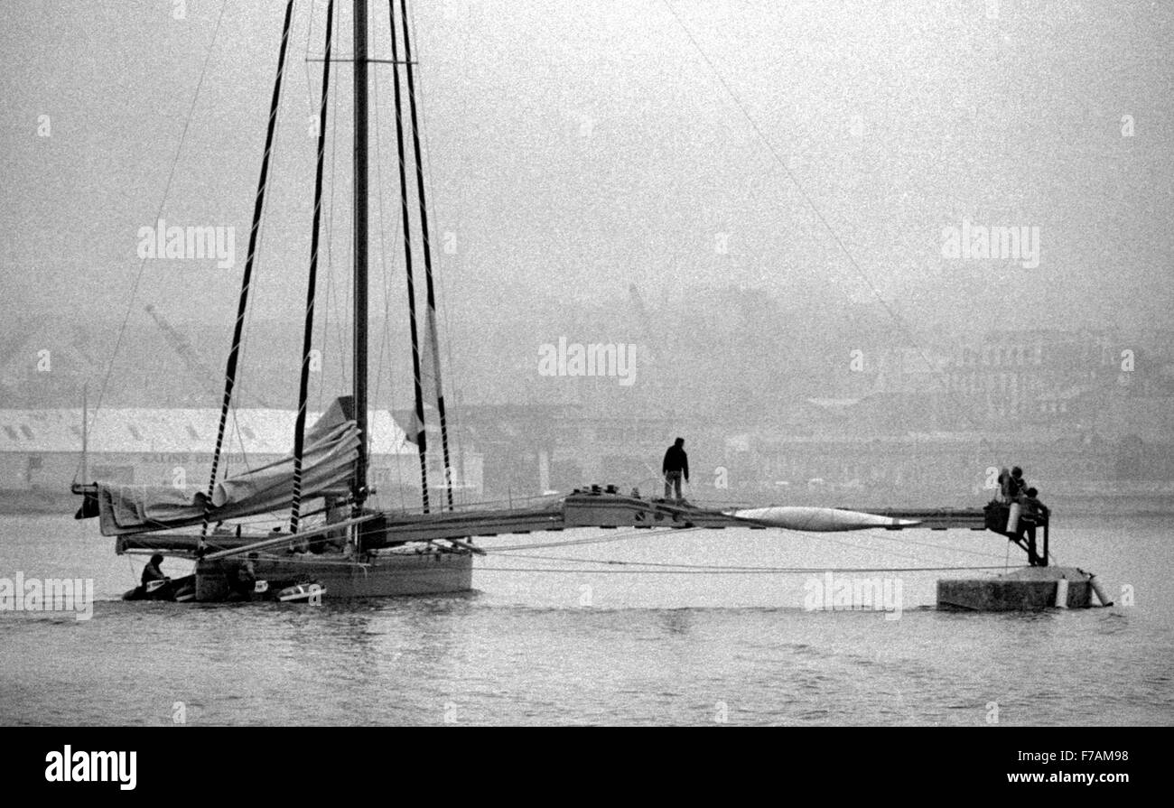 AJAX NEWS PHOTOS. 1982. ST.MALO, FRANCE. - ROUTE DU RHUM RACE - GILLES OLLIERS DESIGNED PACIFIC PROA ROSIERES SKIPPERED BY GUY DELAGE (FR) LEAVING BASSIN VAUBIN. VESSEL COLLAPSED FROM STRUCTURAL FAILURE SHORTLY AFTER THE START. PHOTO:JONATHAN EASTLAND/AJAX REF:821007 22 Stock Photo