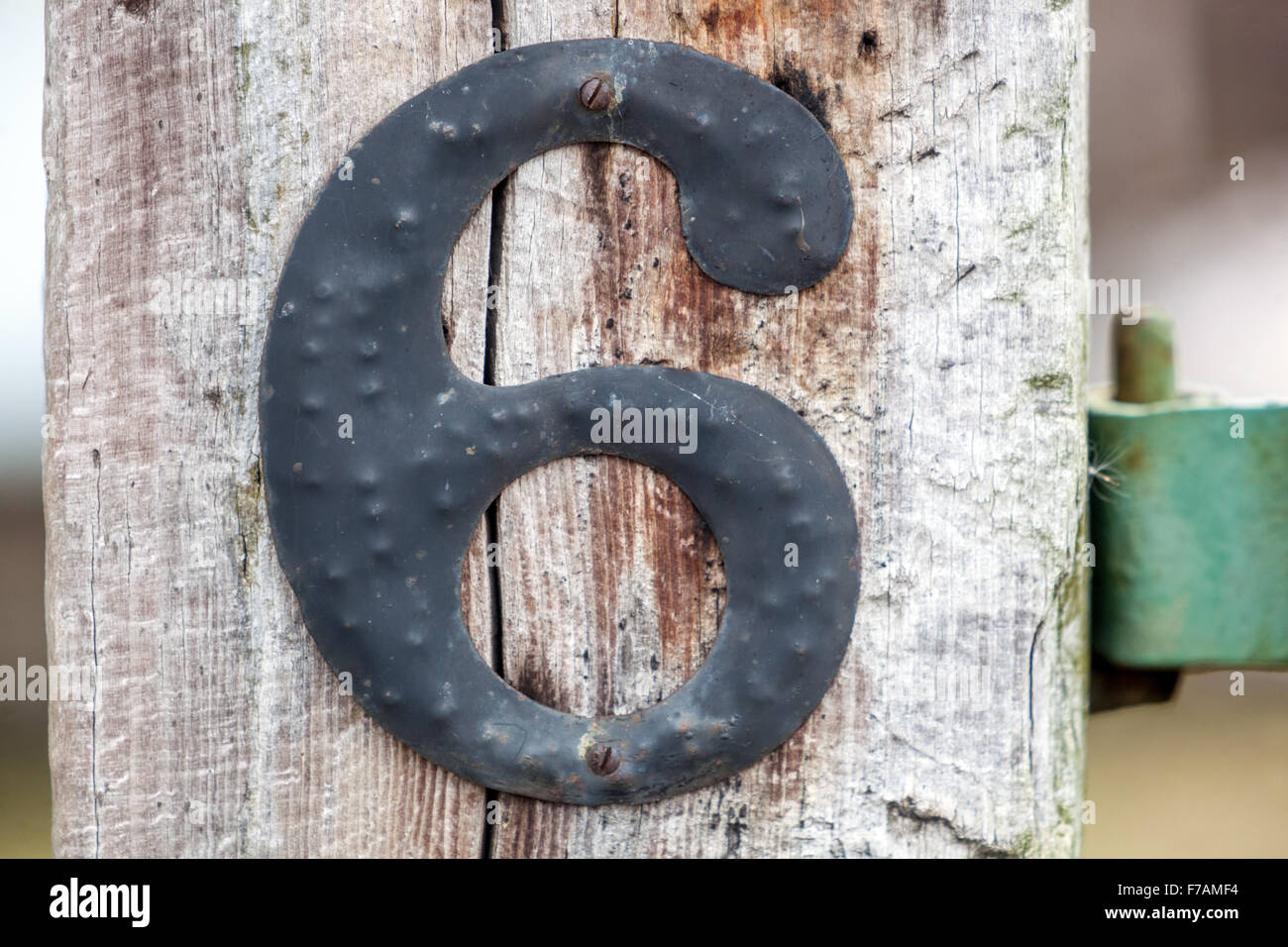The number 6 nailed to a wooden beam, Czech Republic Stock Photo
