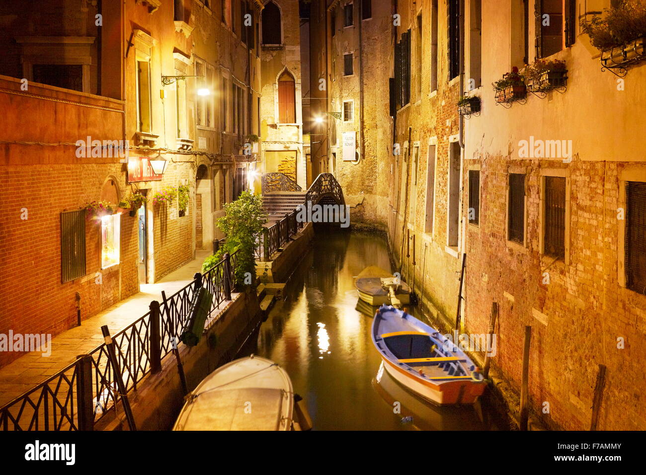 Venetian canal at night, Venice, Italy Stock Photo