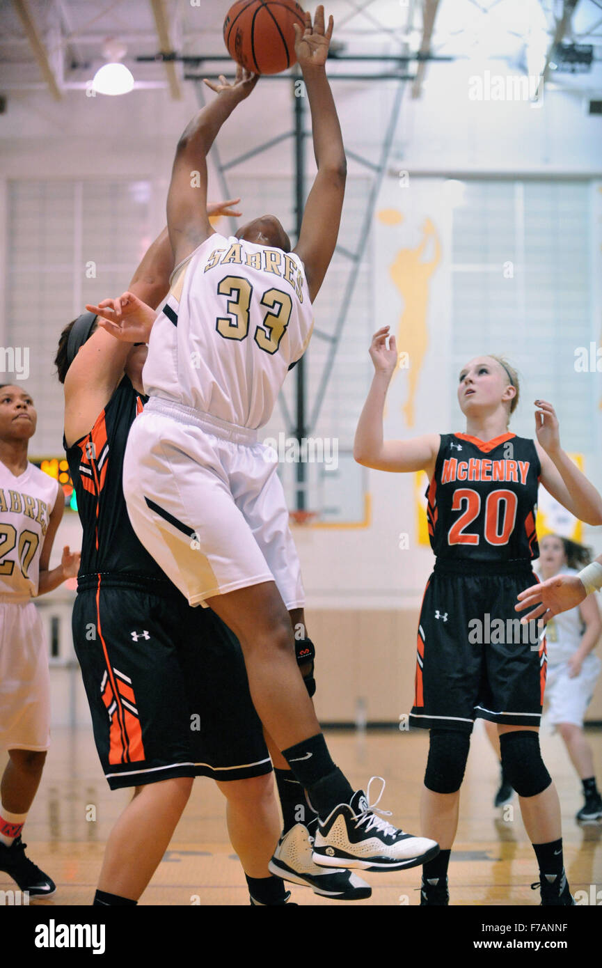Center works to control a rebound off the offensive boards before ...