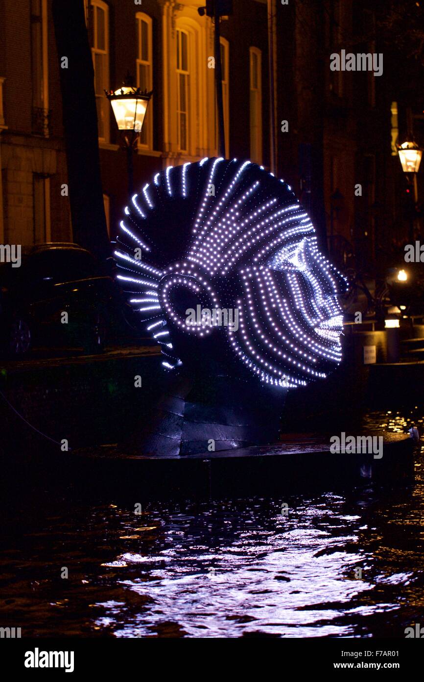 Amsterdam, Netherlands. 27th Nov, 2015. The light artworks named 'Talking heads' is seen in Amsterdam, the Netherlands, Nov. 27, 2015. The fourth edition of Amsterdam Light Festival, to be held from Nov. 28 to Jan. 17, celebrates the theme of Friendship and acknowledges the Dutch EU Presidency in 2016. Light artworks are on exhibition outdoor in the culturally rich neighborhoods. Credit:  Sylvia Lederer/Xinhua/Alamy Live News Stock Photo