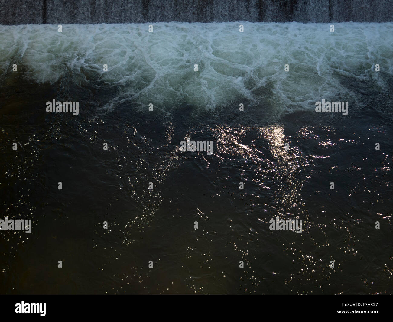 Concrete chute and dam holds the Hoosic River in Adams, Massachusetts to control flooding, built by US Army Corp of Engineers. Stock Photo