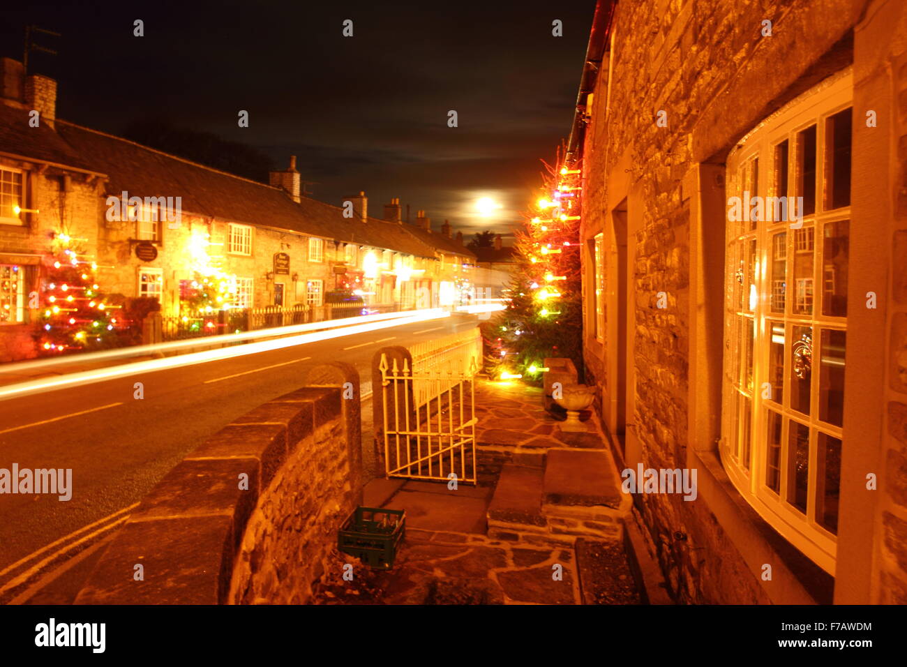 Christmas lights on the main street in Castleton village, Peak District