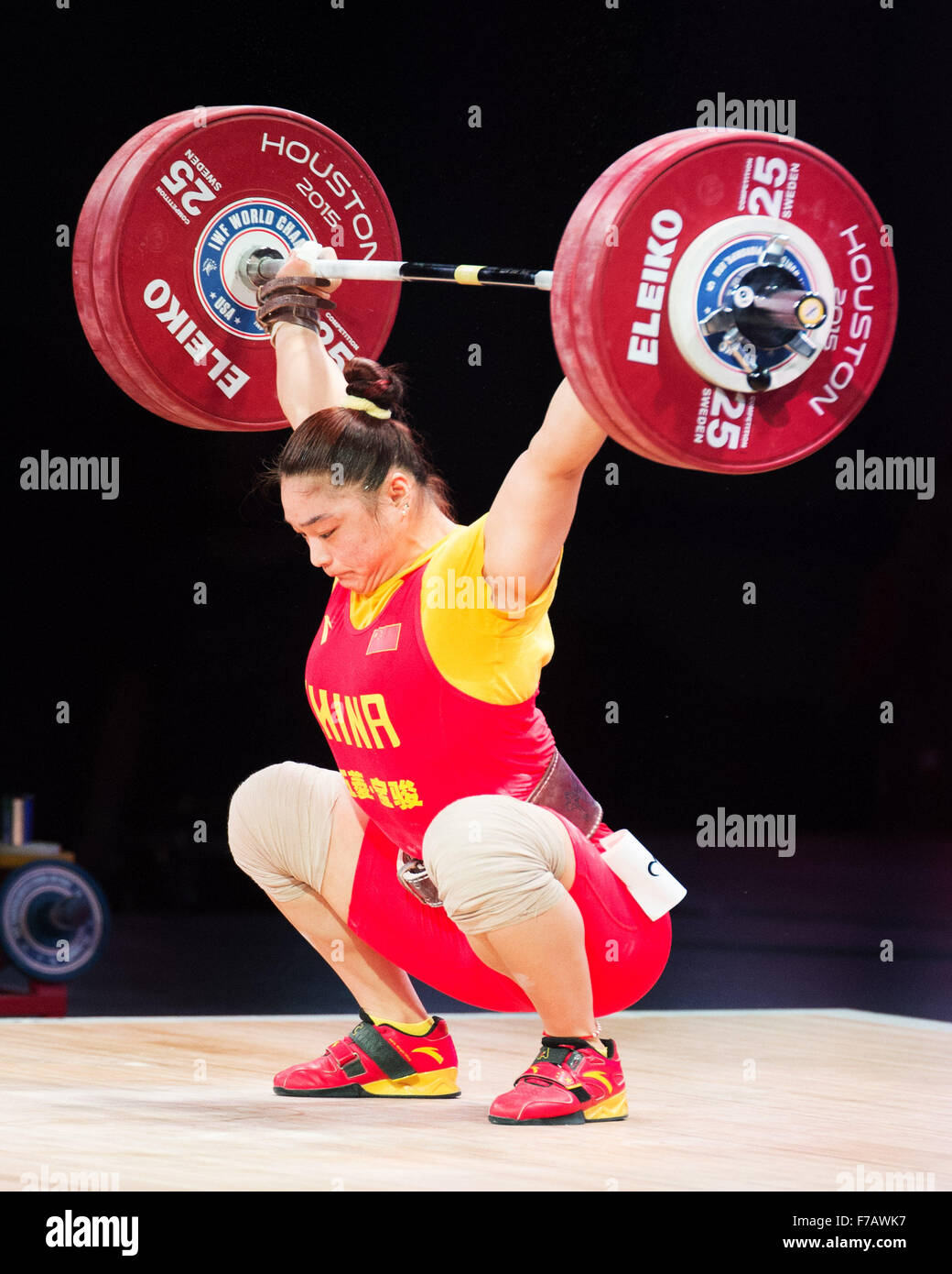 Houston, Texas, USA. November 26, 2015: Kang Yue of China wins the snatch gold and the total gold medas at the World Weightlifting Championshipsl in Houston, Texas. Credit:  Brent Clark/Alamy Live News Stock Photo