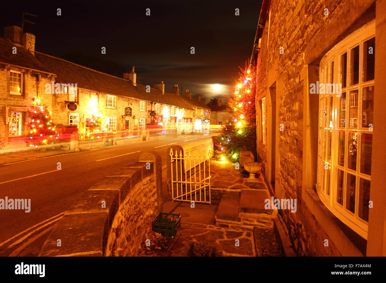 Christmas lights on the main street in Castleton village, Peak District National Park, Derbyshire,England, UK Stock Photo