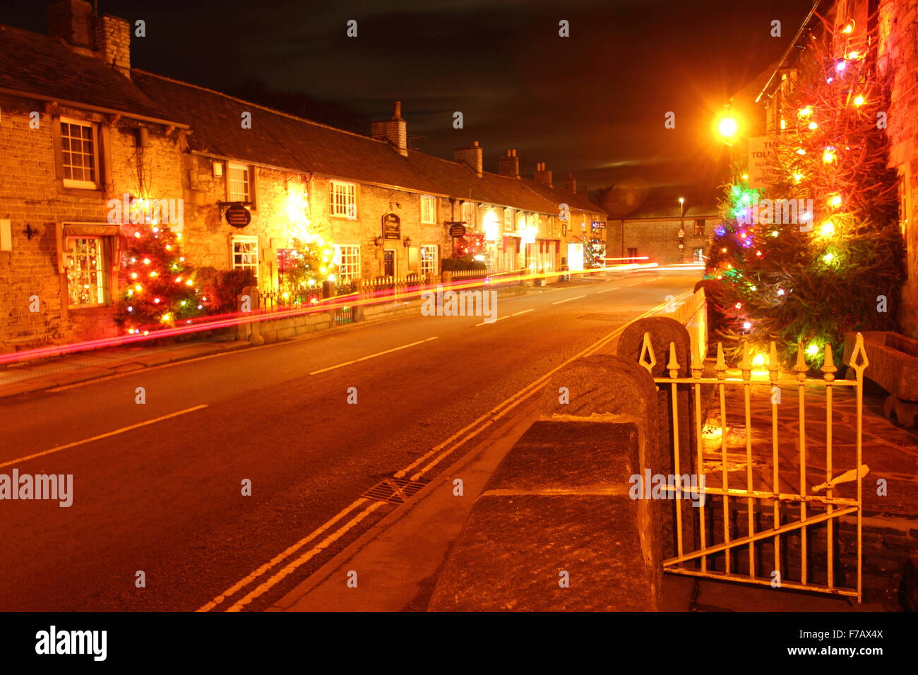 Christmas lights on the main street in Castleton village, Peak District