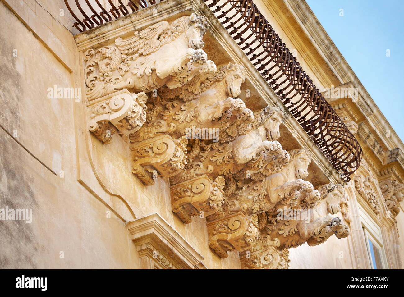 Noto - baroque details of balcony at the Palazzo Villadorata (Palazzo Nicolaci), Noto, Sicily, Italy UNESCO Stock Photo