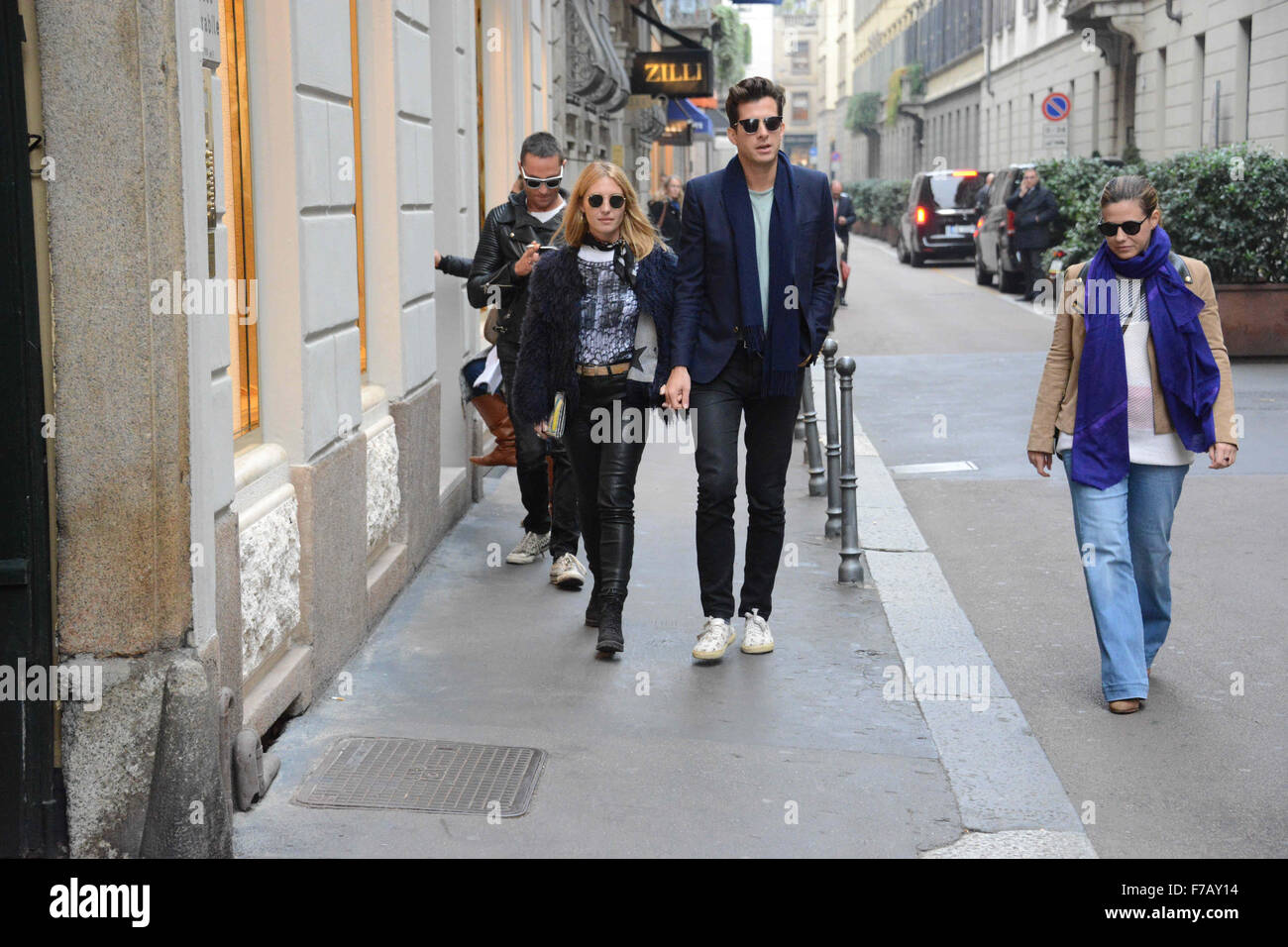 Mark Ronson and his wife Josephine de la Baume hold hands as they leave Il Salumaio restaurant after lunch with friends Pietro Tavallini, Francesca Versace for a shopping spree at Versace and Brioni  Featuring: View, Mark Ronson, Josephine de la Baume, Pi Stock Photo