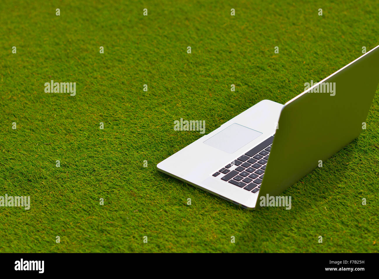 laptop comuter on grass, freedom communication concetp and education and study Stock Photo