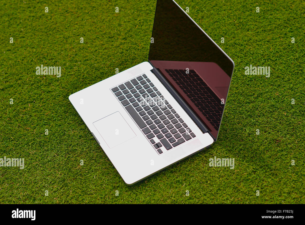 laptop comuter on grass, freedom communication concetp and education and study Stock Photo