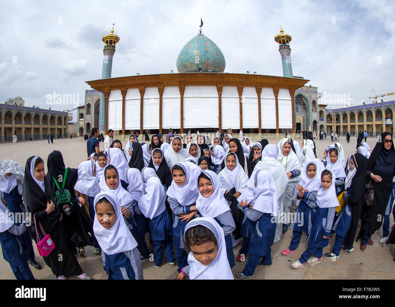 Veiled Veiled Muslim Shiite Schoolgirls In Front Of The Shah-e-cheragh Mausoleum, Fars Province, Shiraz, Iran Stock Photo