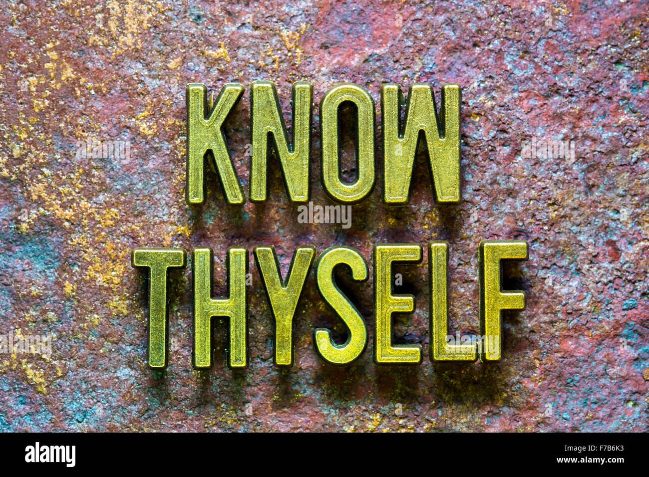 know thyself phrase made from metallic letters over rusty metallic background Stock Photo