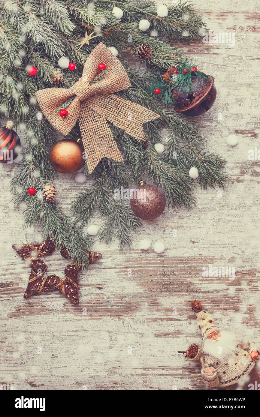 Beautiful Christmas background with snow fir tree. The tip of a tree