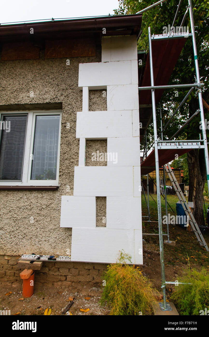 Reconstruction of the old house (insulation facade polystyrene). Stock Photo