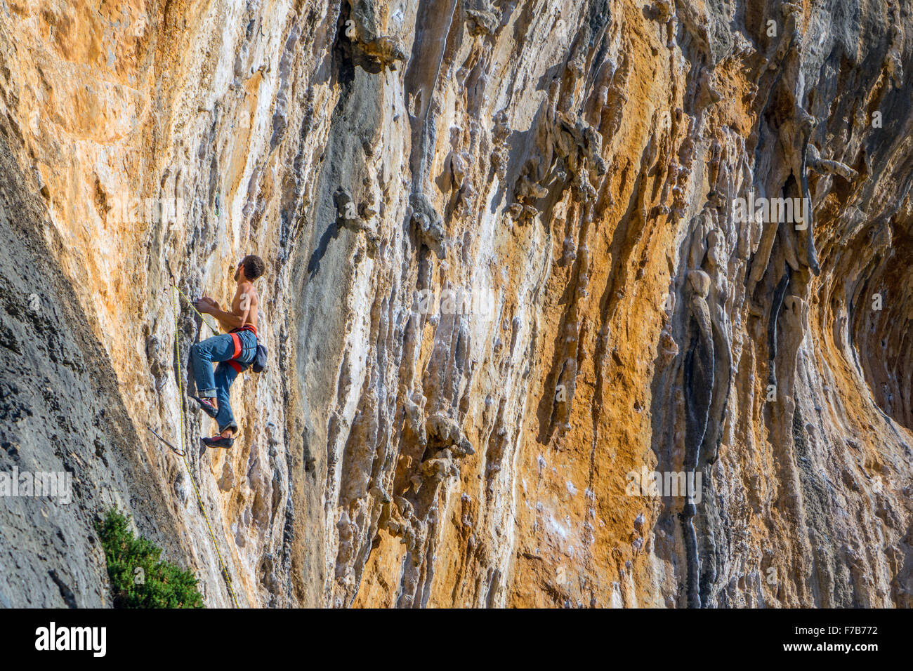 Rock climber on sunny cliff, sport climbing, Kalymnos, Greece Stock Photo Alamy